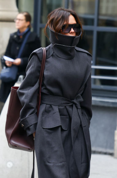 Victoria Beckham succumbs to the coat trend she started herself