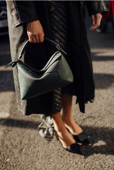 Loewe's voluminous Puzzle bag has acquired the status of a bag with an origami design.
