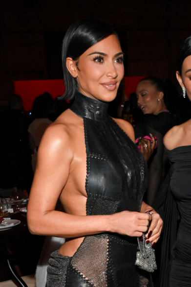 Kim Kardashian stuns with a look that's more skin and mesh than a real dress