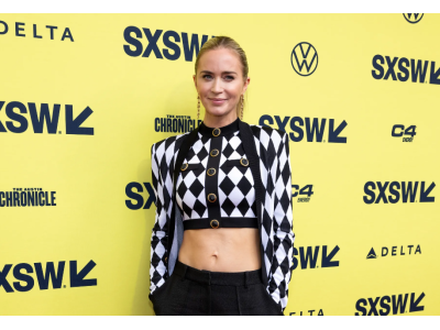 Emily Blunt in sporty style with a crop top and low-waist pants