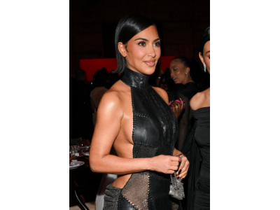 Kim Kardashian stuns with a look that's more skin and mesh than a real dress