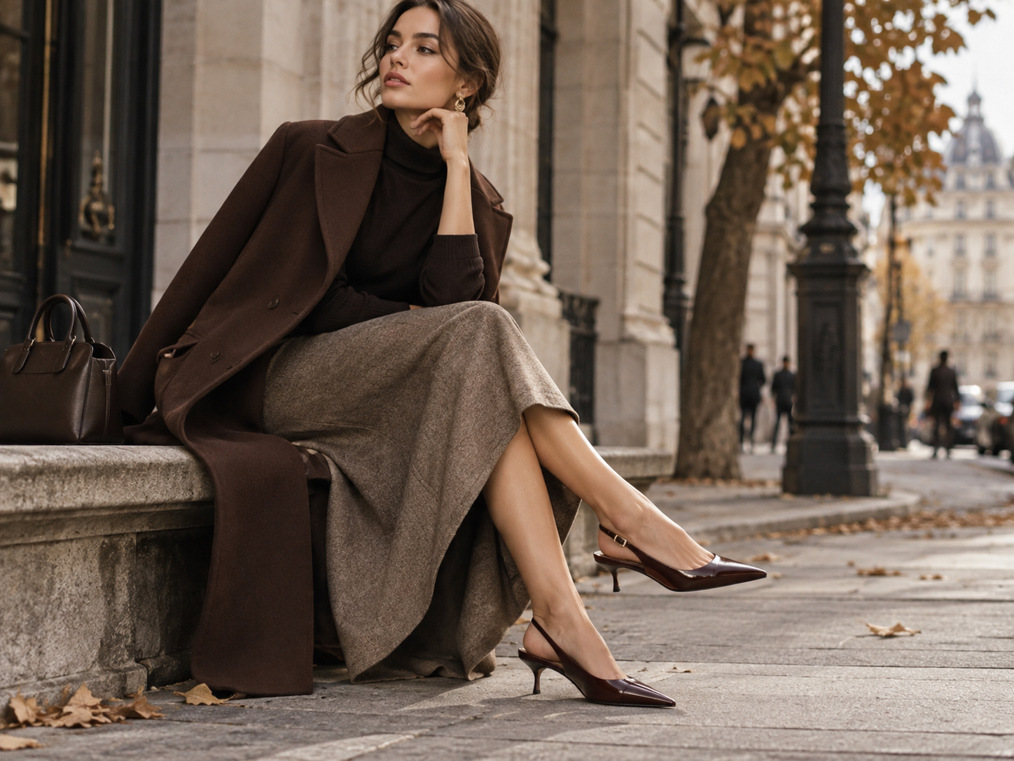 Elegant womens outfit with slingback shoes low heel midi skirt and brown coat