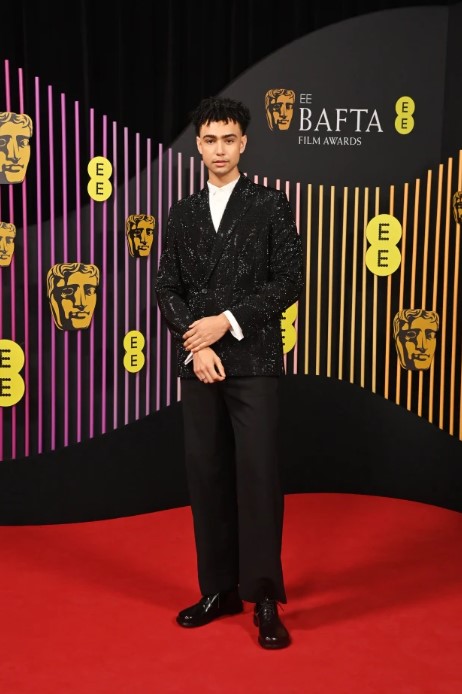 ARCHIE MADEKWE WEARING LOEWE